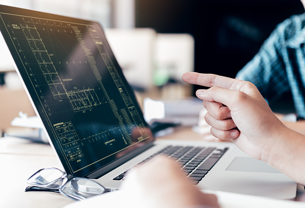 Teenagers develop programming with blueprint code in laptop monitor. Teenagers develop programming with blueprint code in laptop monitor.